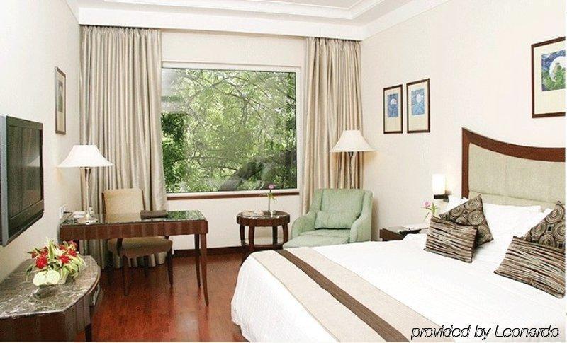 Muse Sarovar Portico Nehru Place Nova Deli Quarto foto